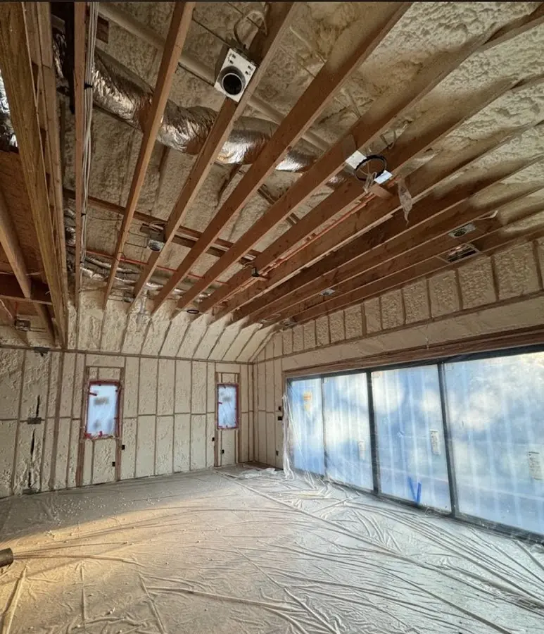 Interior walls and ceiling insulated with spray foam during new construction in Natchez